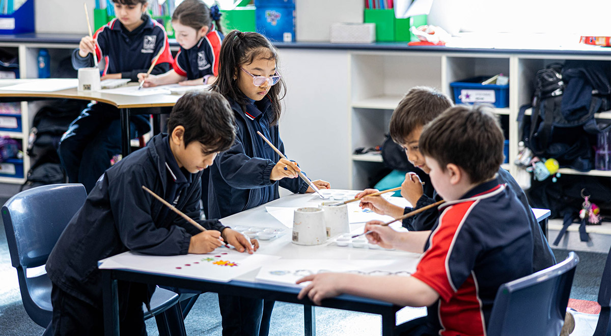 Students paining at St Oliver’s Catholic Primary School Harris Park