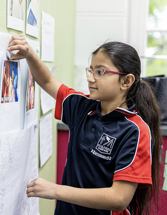 Girl at learning wall St Oliver’s Catholic Primary School Harris Park