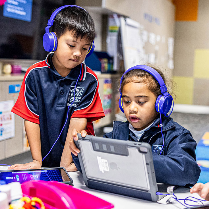 Students with learning devices at St Oliver’s Catholic Primary School Harris Park